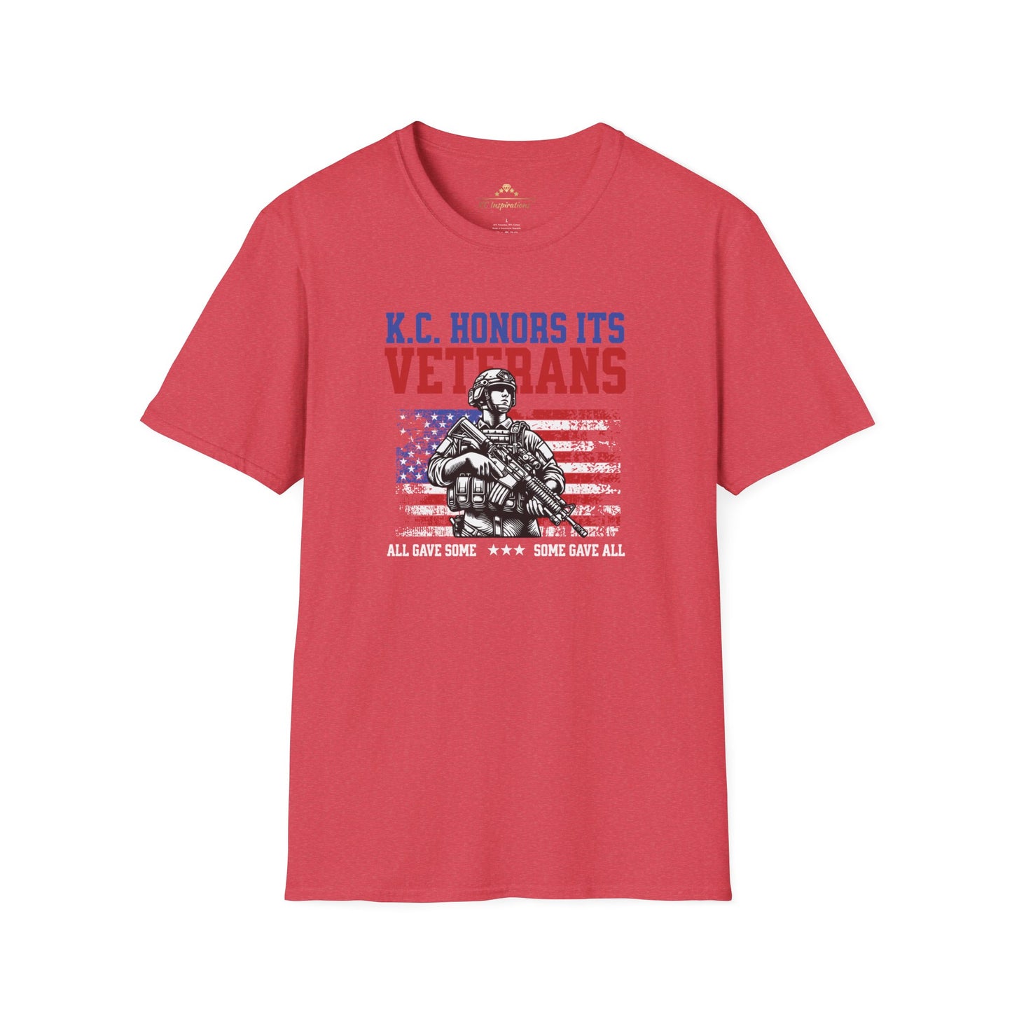 A navy blue KC Honors Its Veterans - Kansas City Inspired T-Shirt featuring a soldier with the American flag in the background. Text above reads "KC Honors Its Veterans," and below it reads "All Gave Some ★★★ Some Gave All." Perfect for showing your support for the veteran community. Brought to you by KC Inspirations.