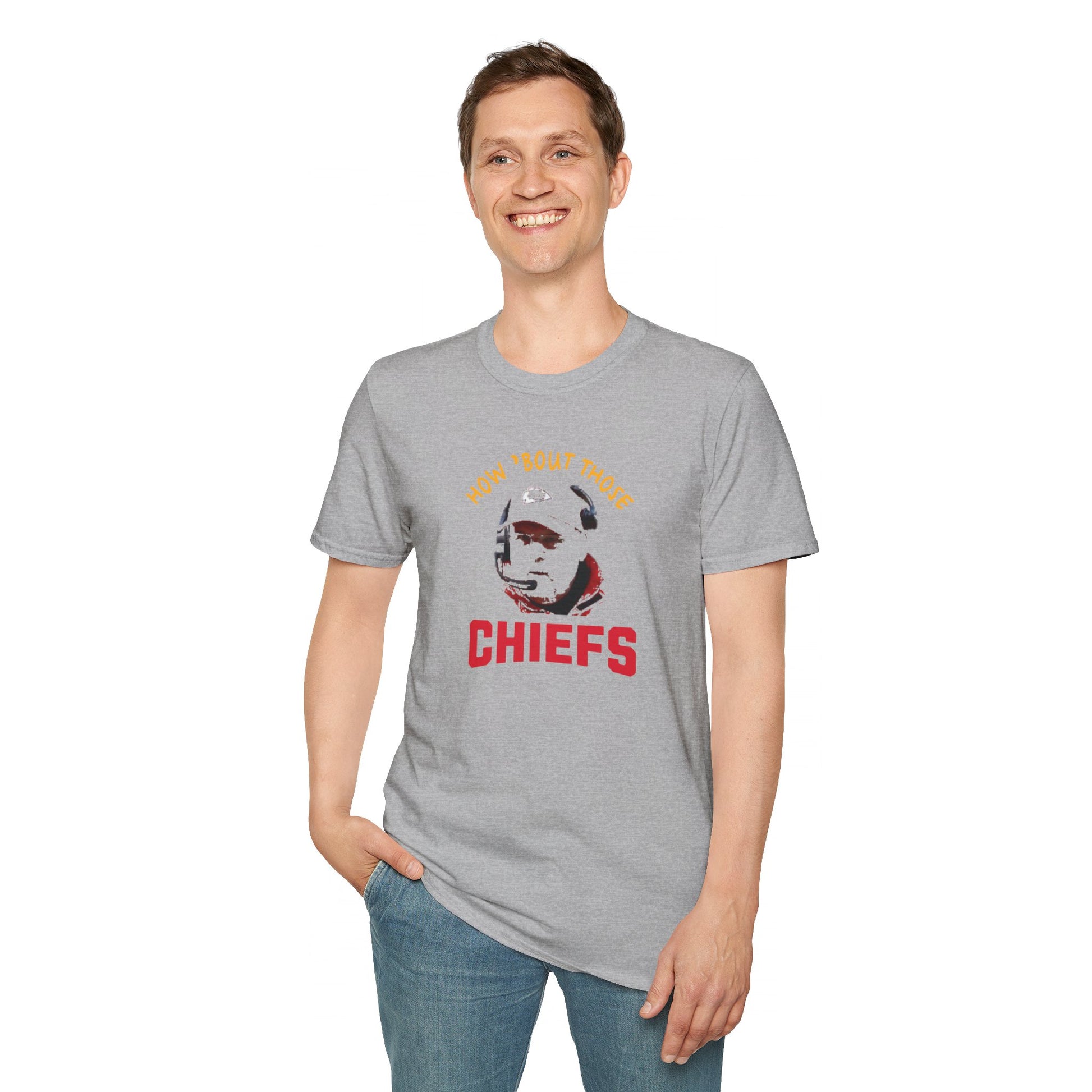 The Printify How 'Bout Those Chiefs - Kansas City Chiefs Inspired T-Shirt: Red featuring the text "HOW 'BOUT THOSE CHIEFS" in yellow and red above a stylized image of Andy Reid's face. The word "CHIEFS" is prominently displayed in large red letters beneath the image.