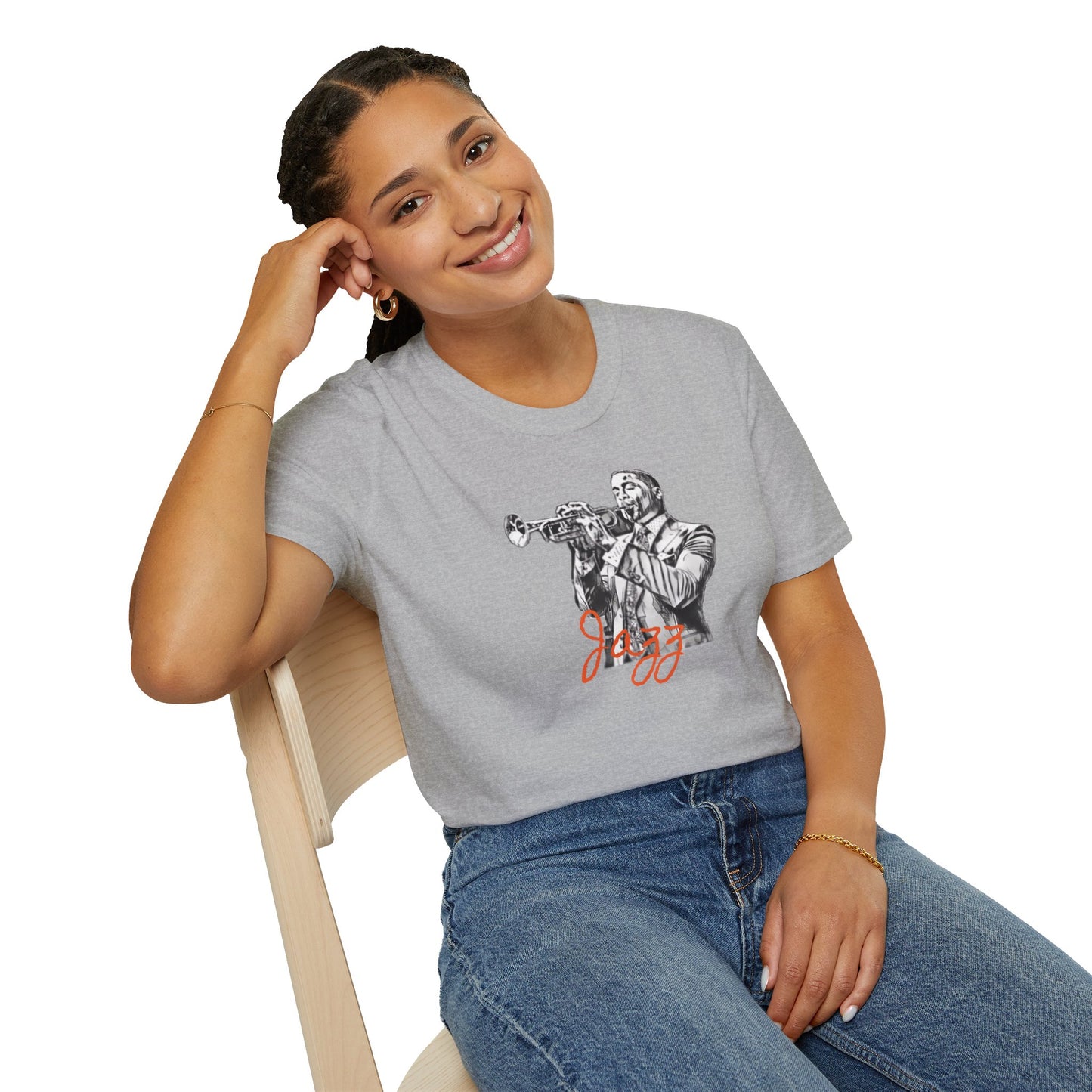 A blue T-shirt featuring a monochrome illustration of a jazz musician playing a trumpet, with the word "Jazz" in red script underneath the image. Perfect for music lovers and fans of Kansas City Jazz, The Trumpeter - KC Jazz Inspired T-Shirt by KC Inspirations is an ideal choice.