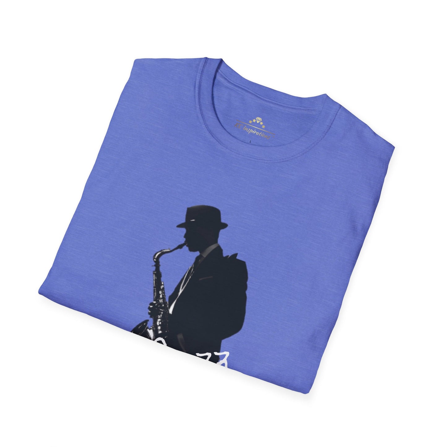 The Saxophonist - KC Jazz Inspired T-Shirt by KC Inspirations is a blue t-shirt featuring a black silhouette of a saxophonist wearing a hat, with the word "Jazz" written in white cursive text below the image. Perfect for music lovers and fans of Kansas City Jazz.