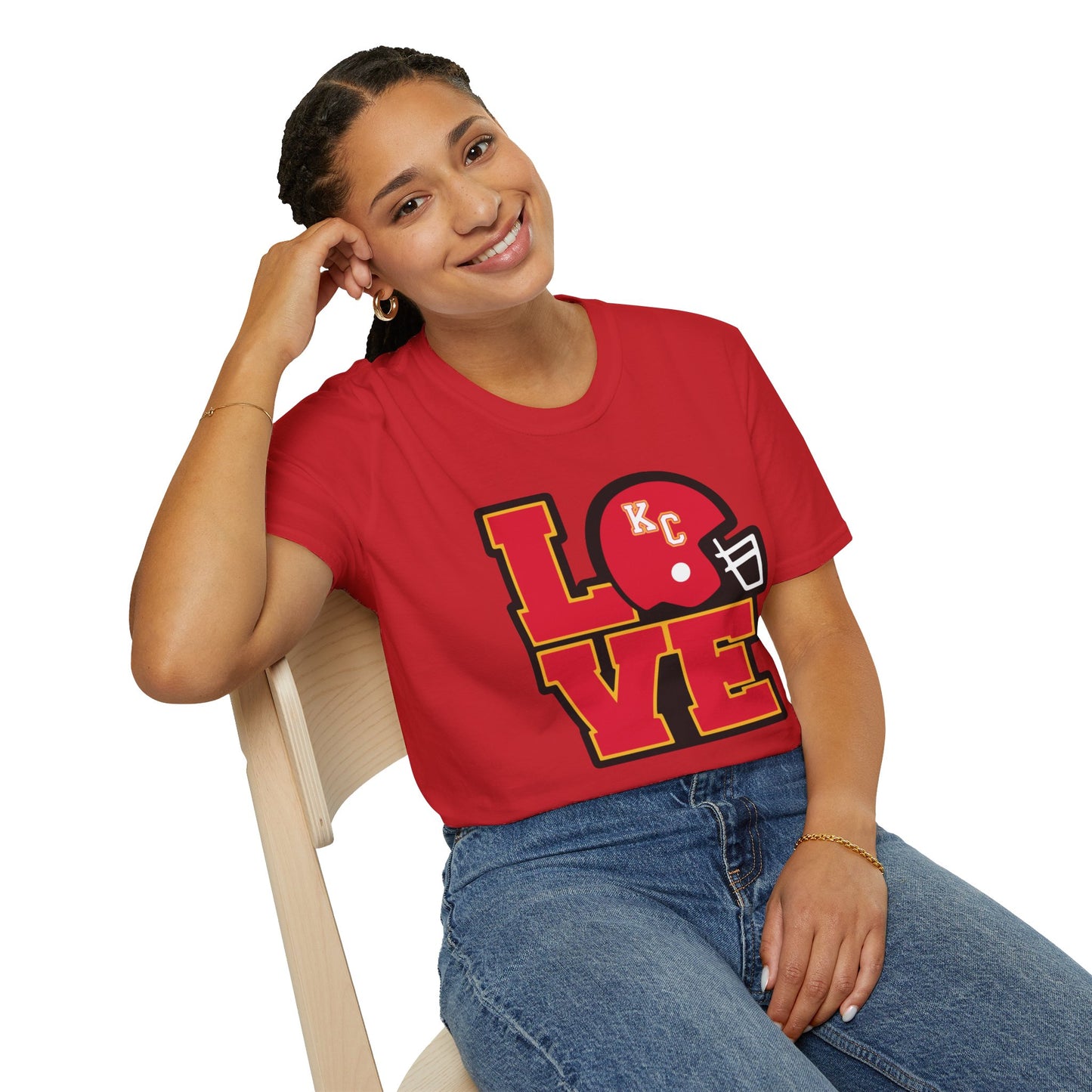 This black LOVE KC - Modern - Kansas City Chiefs Inspired T-Shirt by KC Inspirations features the word "LOVE" in large, bold red and yellow letters. The "O" is replaced by a red football helmet with a white facemask and "KC" on it, making it perfect fan gear for any Kansas City Chiefs supporter.