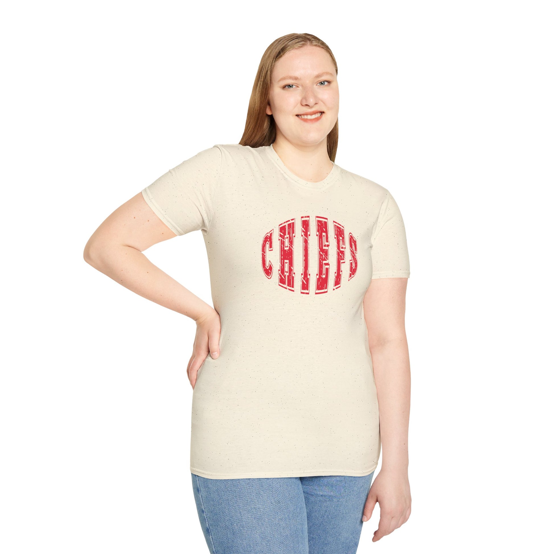 A Football Chiefs Vintage - Kansas City Chiefs Inspired T-Shirt by KC Inspirations with the word "CHIEFS" printed in large, red, bold letters across the chest. The letters have a slightly weathered look, giving the shirt a vintage feel. This Kansas City Chiefs gear features a classic round neck and short sleeves.