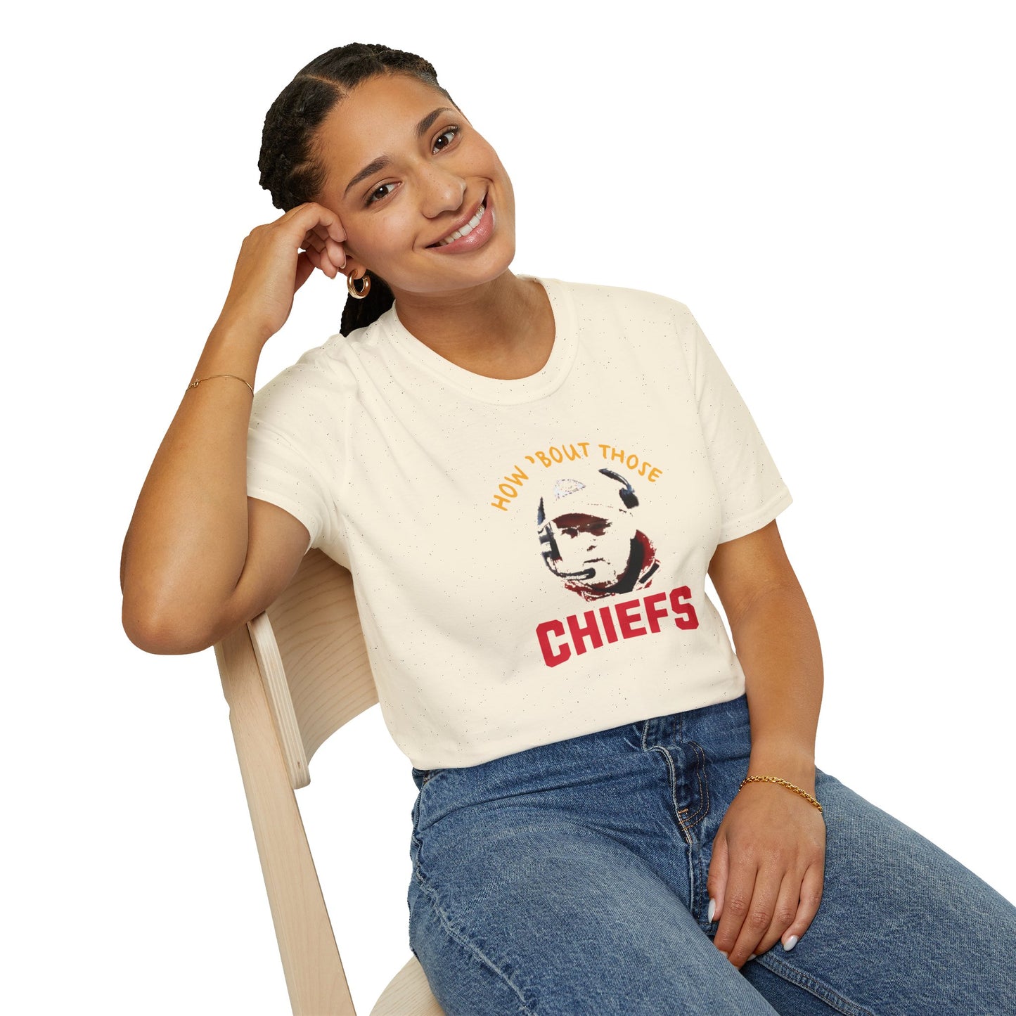 The KC Inspirations How 'Bout Those Chiefs - Kansas City Chiefs Inspired T-Shirt: Red featuring the text "HOW 'BOUT THOSE CHIEFS" in yellow and red above a stylized image of Andy Reid's face. The word "CHIEFS" is prominently displayed in large red letters beneath the image.