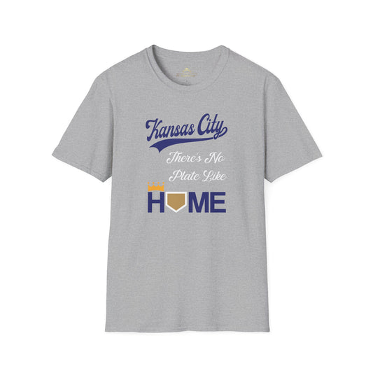 The No Plate Like Home - Kansas City Royals Inspired T-Shirt by KC Inspirations features crisp graphics and the phrase "Kansas City" in blue script at the top. Below it, the text "There's No Plate Like" is written in white, and at the bottom "HOME" is in blue, with the letter "O" depicted as a baseball home plate with a yellow crown on top. Perfect baseball fan apparel.