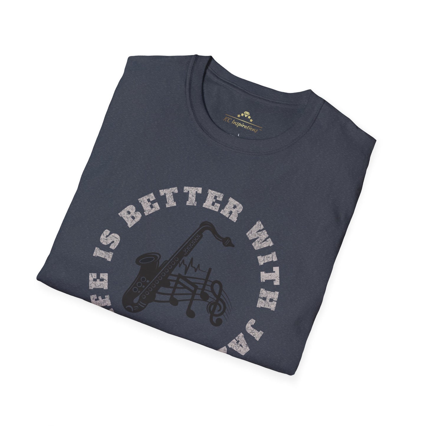 A dark blue Life Is Better With Jazz - K.C. Jazz Inspired T-Shirt by KC Inspirations with the text "Life is Better with Jazz" encircling a graphic of a saxophone and musical notes, perfect for Kansas City jazz enthusiasts. The letters "KC" are printed below the saxophone in stylized font, making it an ideal choice for music lovers.