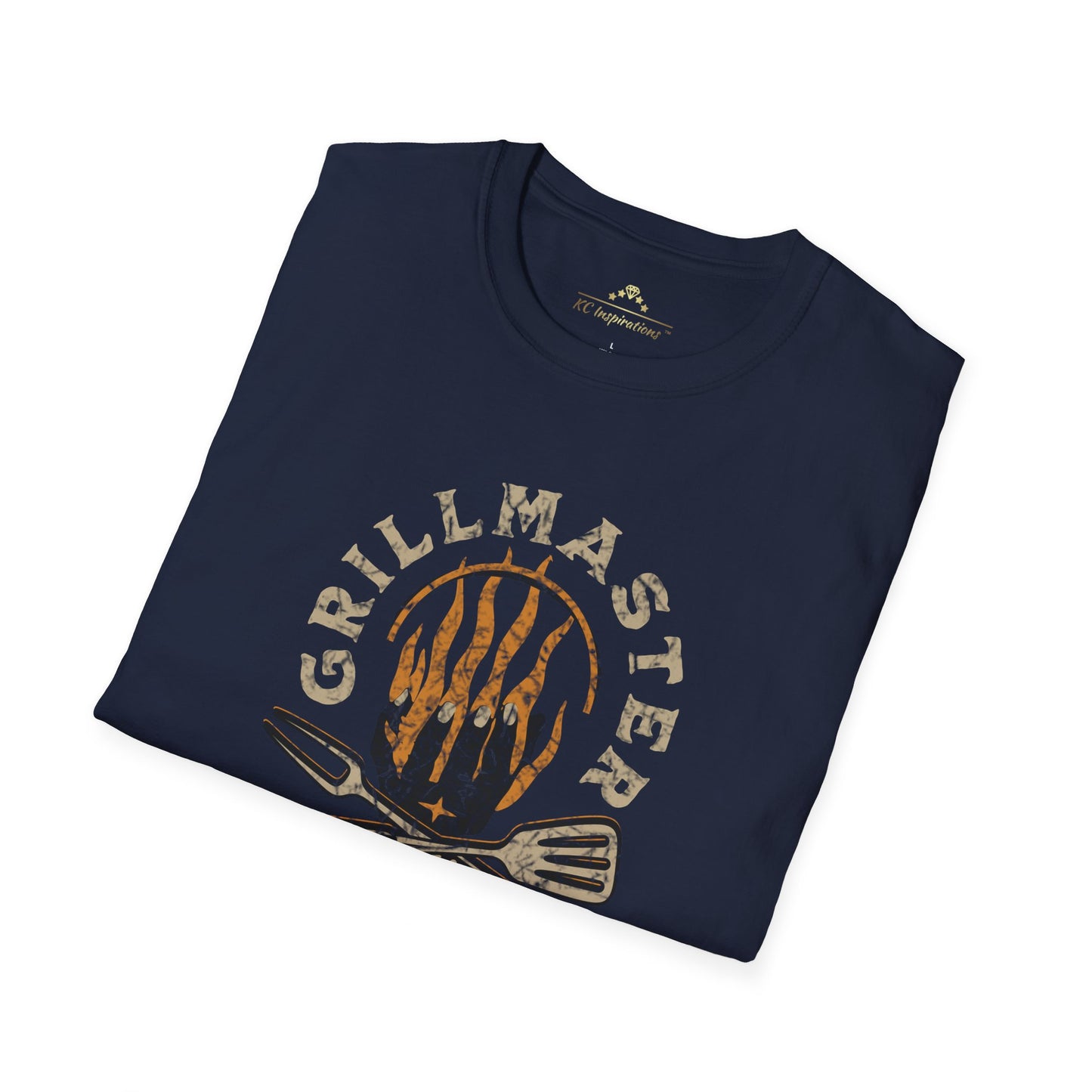 A navy blue short-sleeved **Grill Master Backyard BBQ - K.C. BBQ Inspired T-Shirt** from **KC Inspirations** with a "Grill Master" design on the front. The design features crossed barbecue utensils and flames, with "Kansas City Backyard BBQ" below.