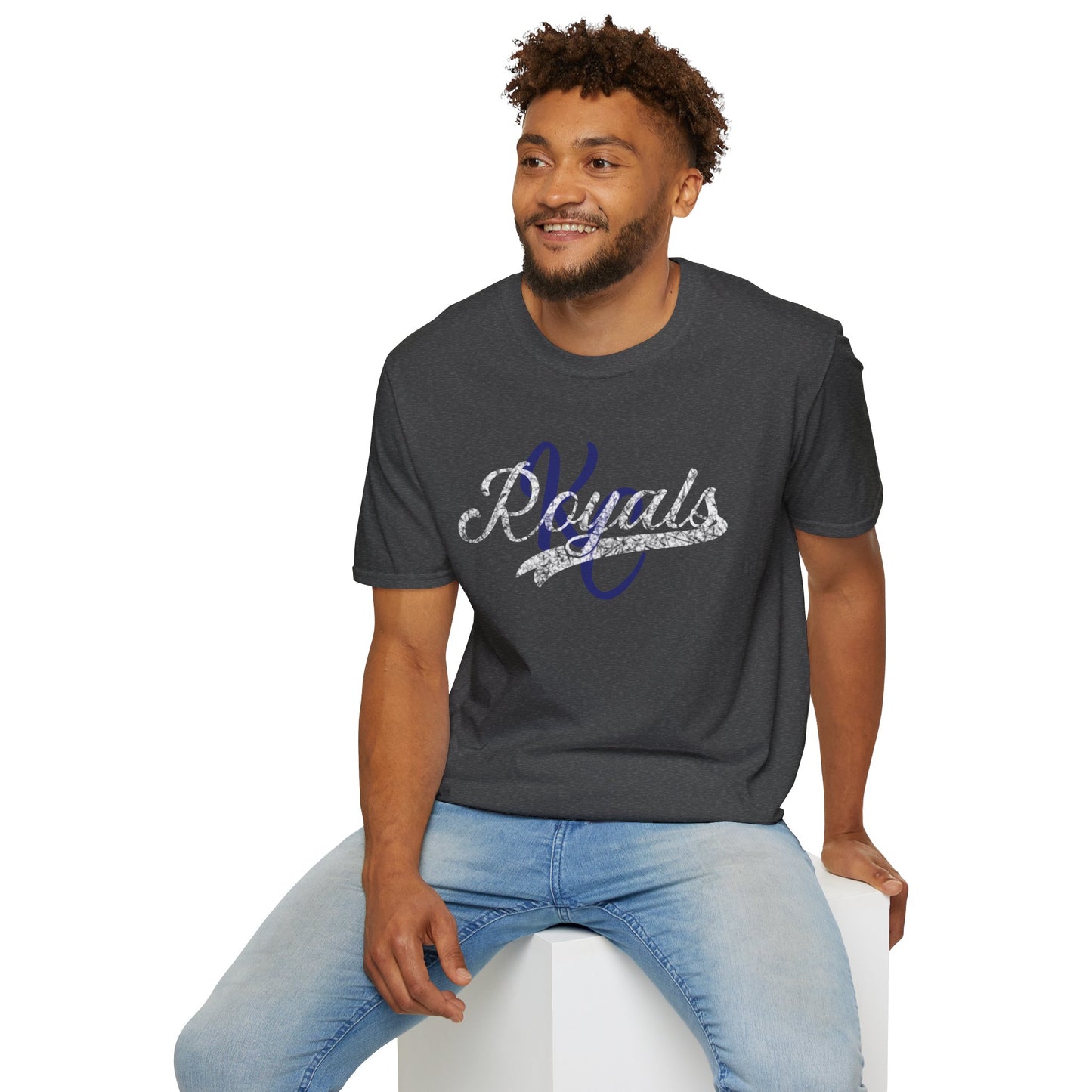 A gray vintage t-shirt featuring the word "Royals" in distressed graphics, written in a decorative script font across the chest in white and dark blue lettering. The short-sleeved Royal KC Semi Distressed - Kansas City Royals Inspired T-Shirt by KC Inspirations is displayed against a plain white background.