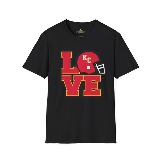 This black LOVE KC - Modern - Kansas City Chiefs Inspired T-Shirt by KC Inspirations features the word "LOVE" in large, bold red and yellow letters. The "O" is replaced by a red football helmet with a white facemask and "KC" on it, making it perfect fan gear for any Kansas City Chiefs supporter.