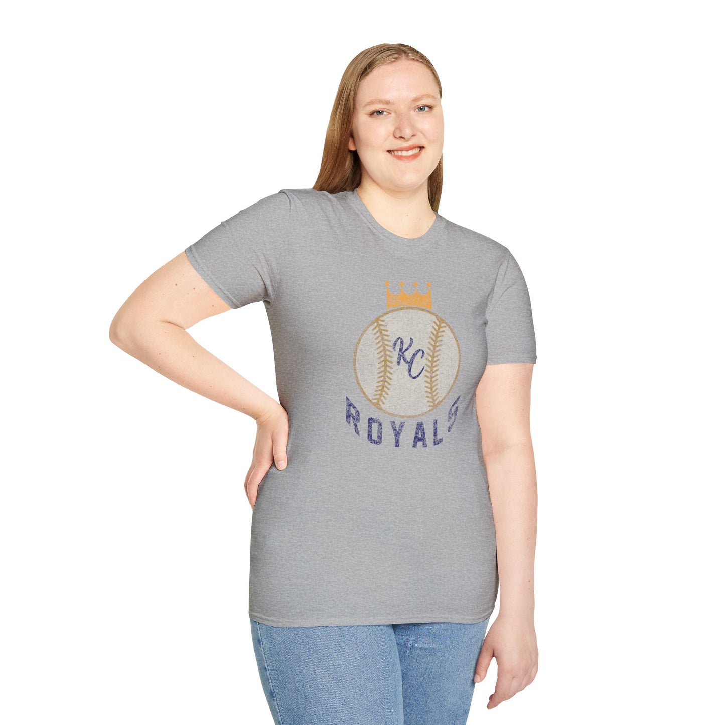 Light blue vintage Crown Baseball - Kansas City Royals Inspired T-Shirt featuring a graphic of a baseball with a crown on top. The letters "KC" are written in the center of the ball, and "Royals" is written in bold, navy blue text below the baseball graphic—a perfect tribute for Kansas City Royals fandom by KC Inspirations.