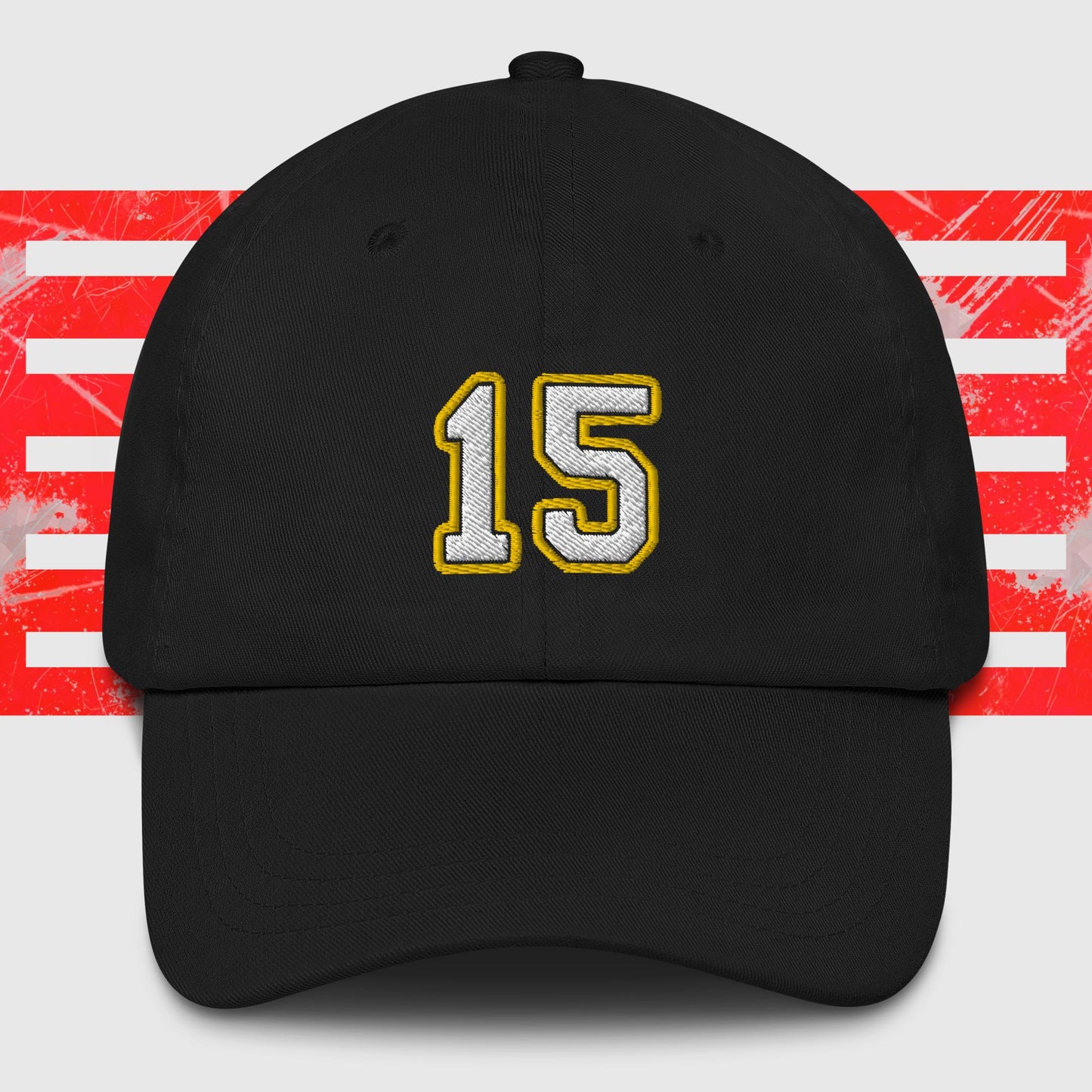 A White & Gold 15 - Kansas City Chiefs Inspired Cap by KC Inspirations with the number "15" embroidered in white and outlined in yellow on the front. The background features horizontal red and white stripes with a distressed texture. This hat also boasts an adjustable strap for a perfect fit.