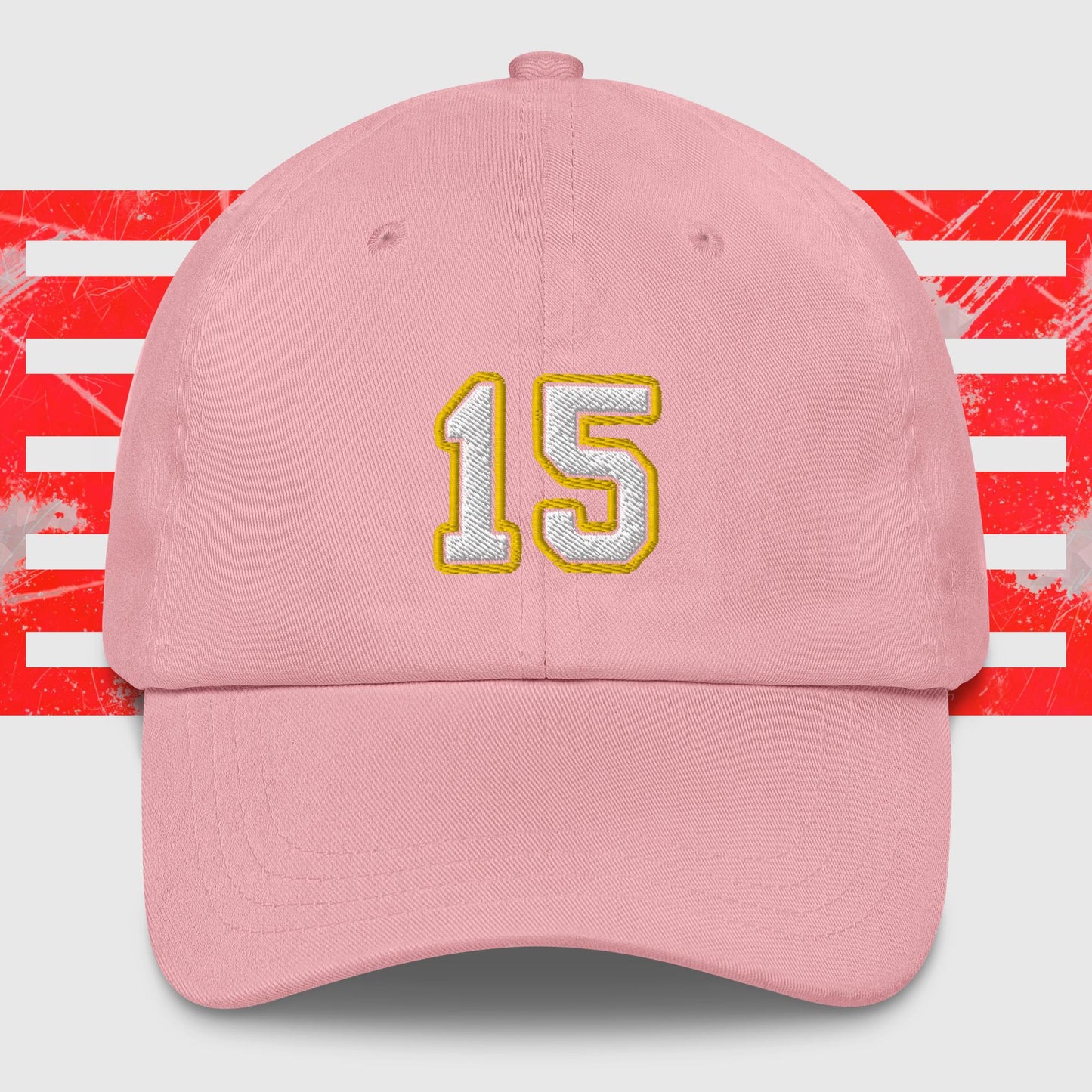 A White & Gold 15 - Kansas City Chiefs Inspired Cap by KC Inspirations with the number "15" embroidered in white and outlined in yellow on the front. The background features horizontal red and white stripes with a distressed texture. This hat also boasts an adjustable strap for a perfect fit.